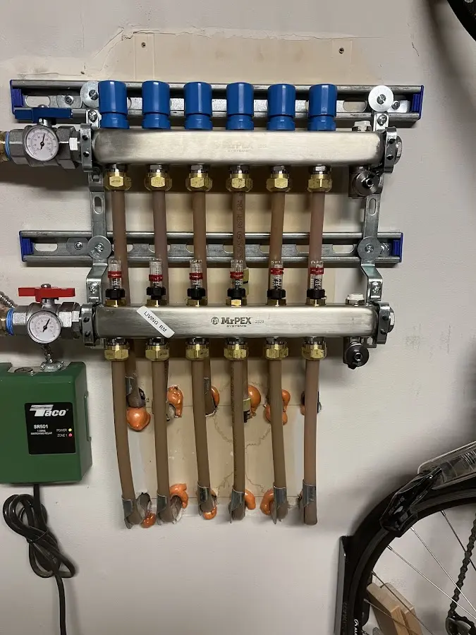 Plumber performing Water Heater Repair at a residential property in North Shore